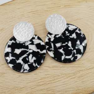 Silver earrings with large round black white resin pendant
