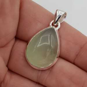 Silver pendant oval cabochon polished its color