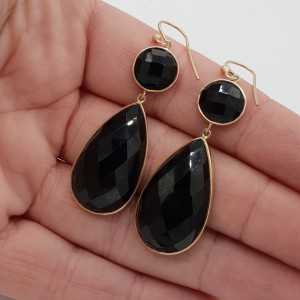 Rosé gold earrings set with round and teardrop Onyx