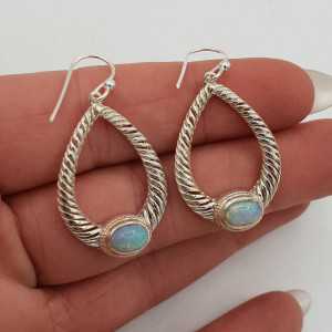 Silver earrings set with Ethiopian Opal