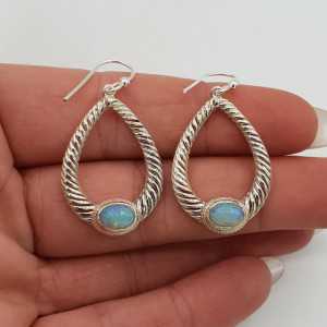 Silver earrings set with Ethiopian Opal
