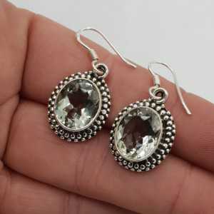 Silver gemstone earrings set with oval faceted green Amethyst