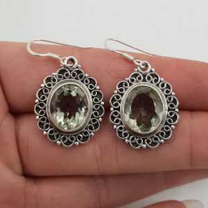 Silver earrings green Amethyst in carved setting
