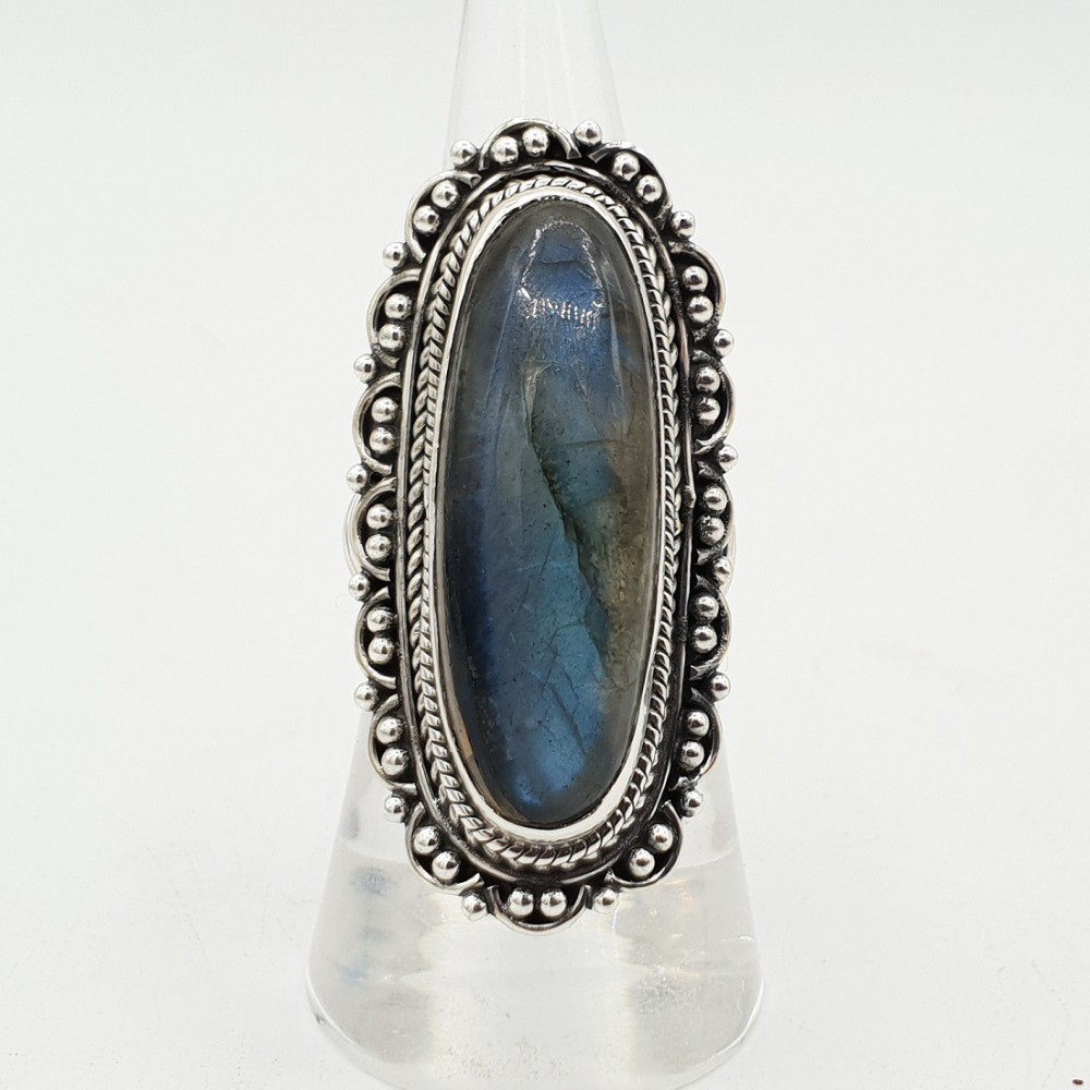 Silver ring with Labradorite and carved head