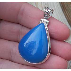 Silver pendant set with oval shape blue Chalcedony