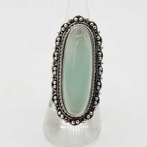 Silver ring with aqua Chalcedony and carved head