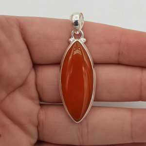 A silver pendant set with a marquise Carnelian