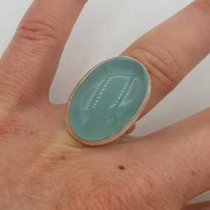 A silver ring with an oval shaped aqua Chalcedony 17.3 mm