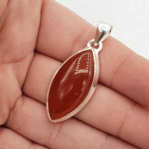 A silver pendant with a marquise Carnelian