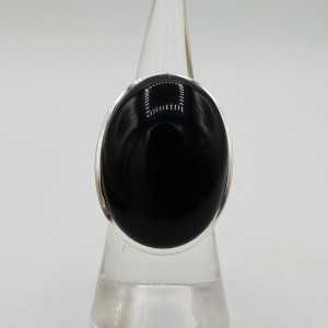 Zilveren ring gezet met grote brede ovale zwarte Onyx 16.5 mm