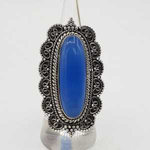 Zilvren ring with blue Chalcedony set in a carved setting
