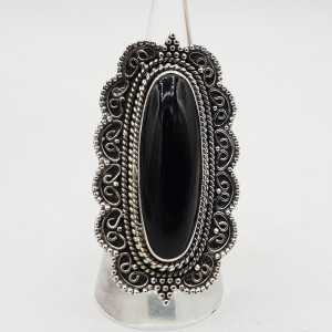 Zilvren ring with black Onyx set in a carved setting
