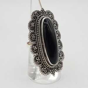 Zilvren ring with black Onyx set in a carved setting