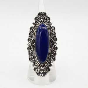 A silver ring set with an oval Lapis Lazuli in any setting