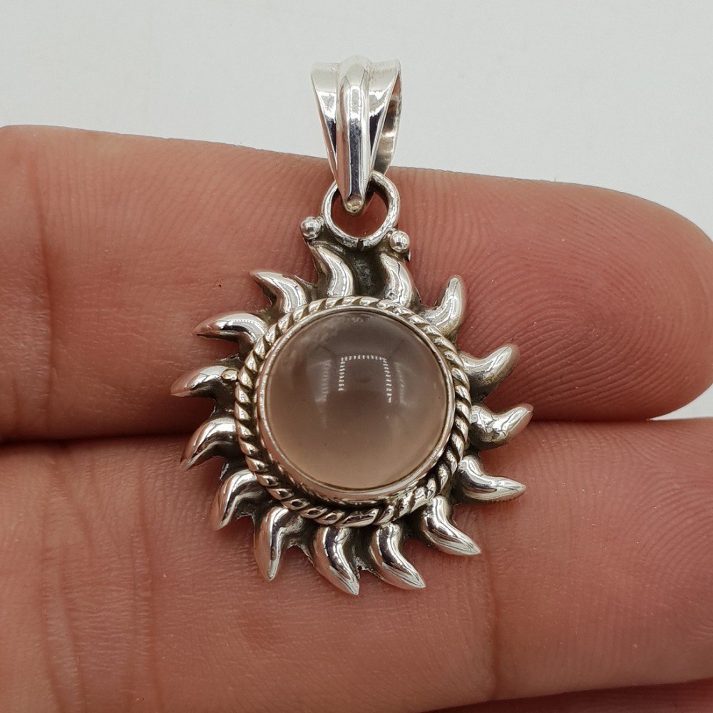 Silver pendant the sun set with a rose quartz