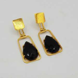 Gold-plated drop earrings featuring teardrop-shaped crystal and black Onyx.