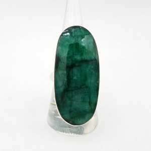 A silver ring set with a large oval-shaped Emerald is 19.3 mm