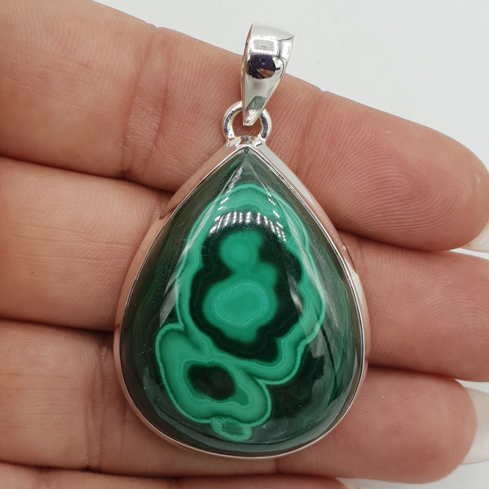 A silver pendant set with large oval cabochon Malachite