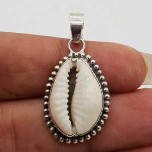 Silver pendant set with Cowrie shell carved setting