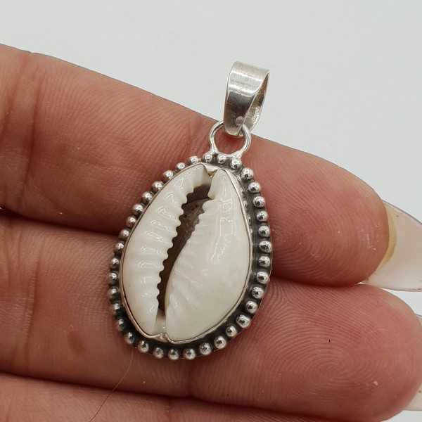 Silver pendant set with Cowrie shell carved setting