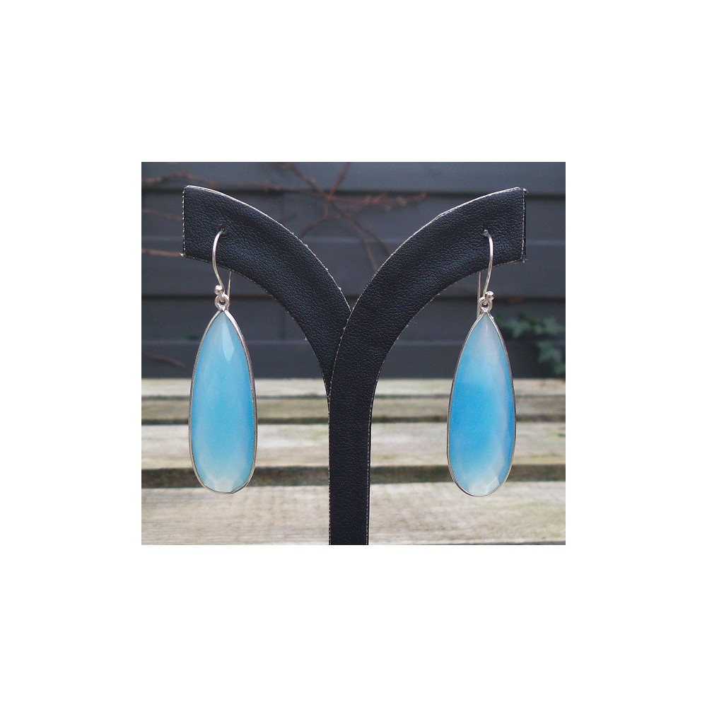 Silver earrings with small oval shape blue Chalcedony briolet