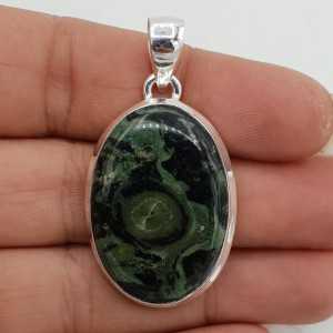 A silver pendant with an oval Kambaba Jasper