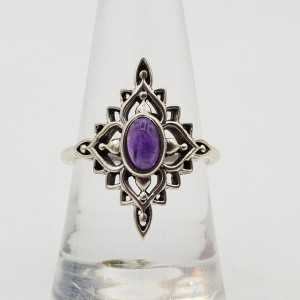 A silver ring set with Amethyst 17.5 mm