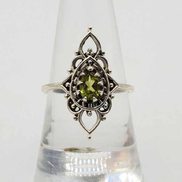 A silver ring set with Peridot 17.5 mm