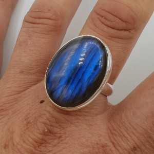 A silver ring set with large oval-shaped Labradorite (19 mm)