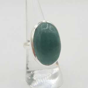 A silver ring set with an oval cabochon Aquamarine 17 mm