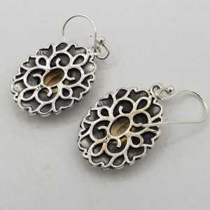 925 Sterling silver drop earrings with oval Rubies in a carved setting