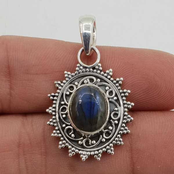 Silver pendant oval-shaped Labradorite carved setting