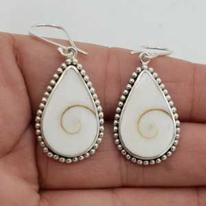 Silver drop earrings with a teardrop shaped Shiva shell and