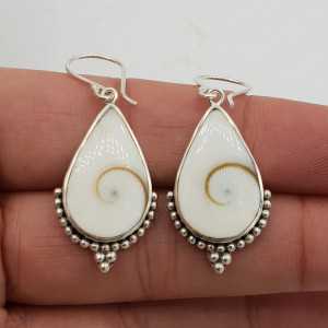 Silver drop earrings made with teardrop shaped Shiva shell and