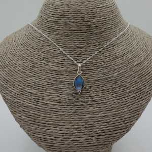 A silver necklace with a Labradorite pendant