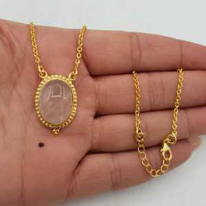 Gold plated earrings with oval shaped rose quartz pendant