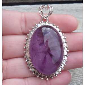Silver pendant with large oval cabochon Amethyst 