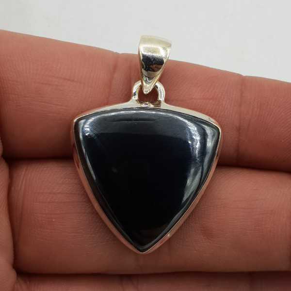 A silver pendant with a triangle-shaped Hematite