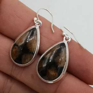 Silver drop earrings set with teardrop-shaped crystal Chiastoliet
