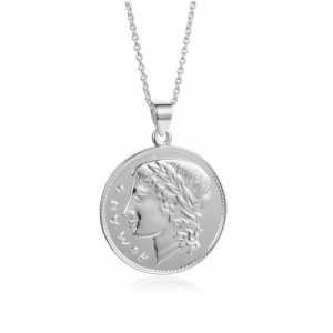 A silver necklace with a coin pendant