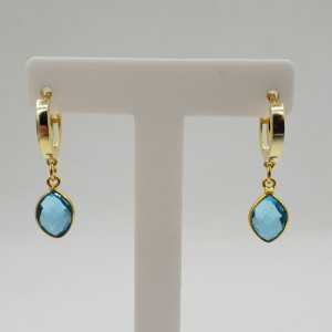 Gold-plated creole with blue Topaz and quartz pendant