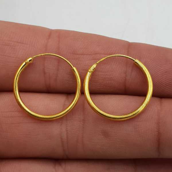 Gold-plated creoles are 18 mm x 1.5 mm)