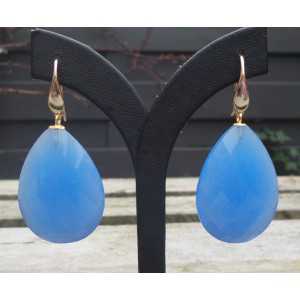 Gold plated earrings set with large faceted blue Chalcedony 