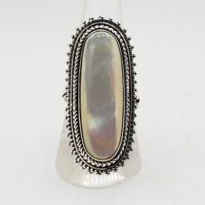 A silver ring set with an oval mother-of-Pearl