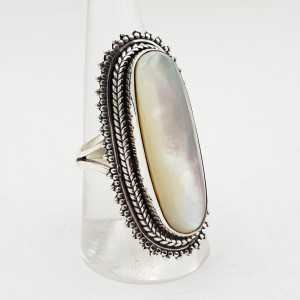 A silver ring set with an oval mother-of-Pearl