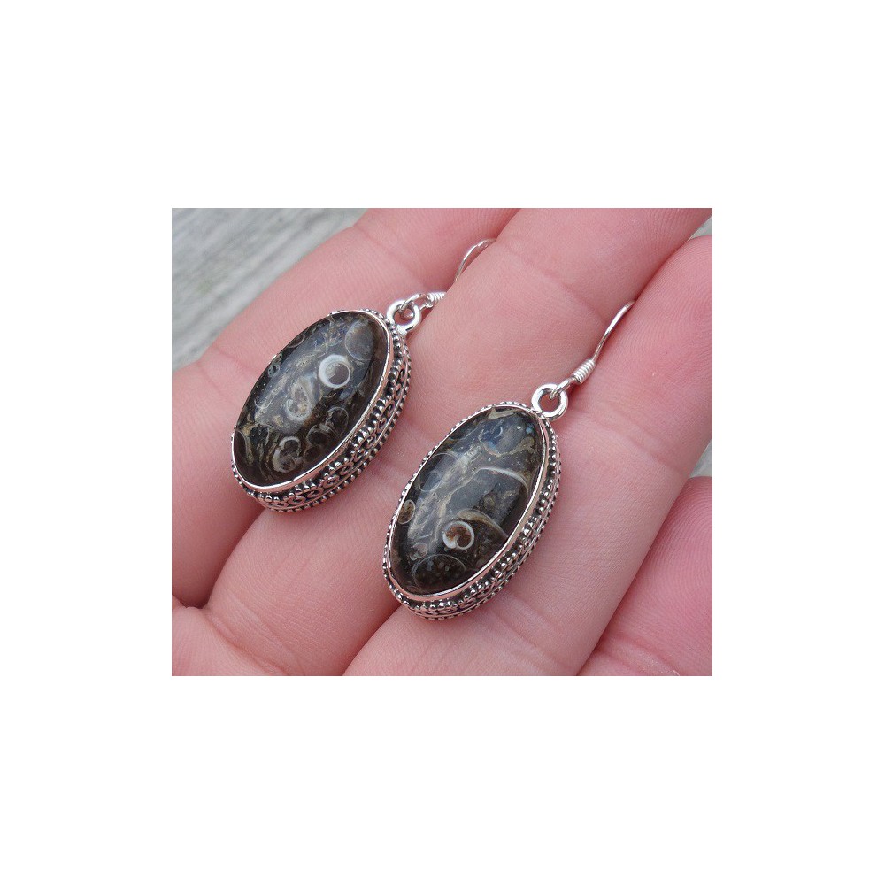 Silver earrings with Turitella Agate set in a carved setting 