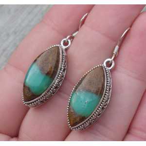 Silver earrings with Boulder Chrysoprase set in a carved setting