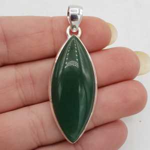 A silver pendant set with a marquise Jade