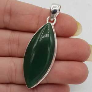 A silver pendant set with a marquise Jade