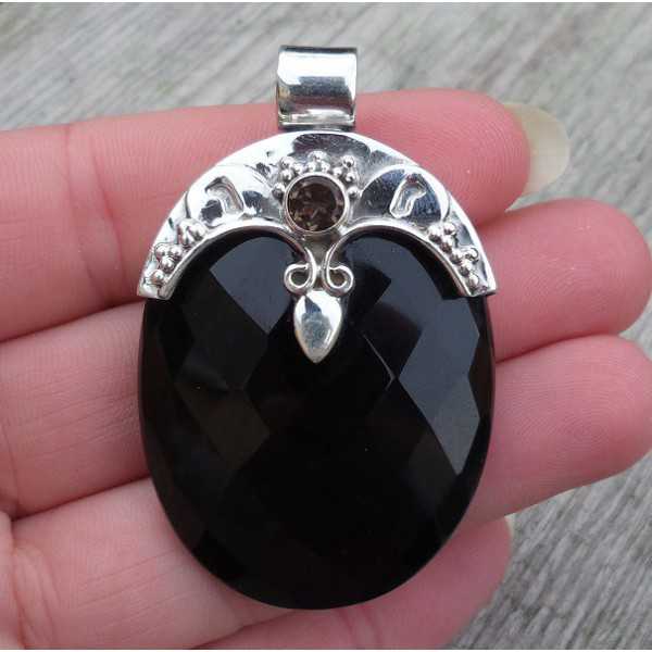 Silver pendant set with oval faceted Onyx and round Smokey Topaz 